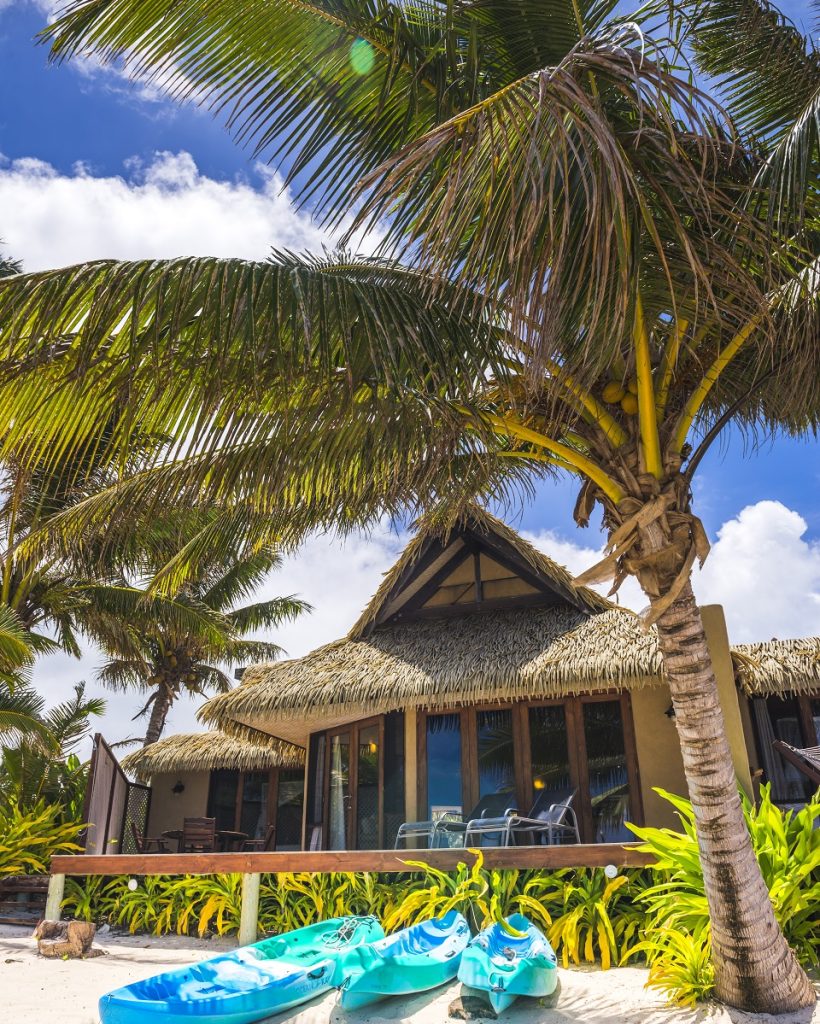 Sea view Luxury Villas on the beach front with tropical palm trees and a sandy beach, Muri, Rarotong